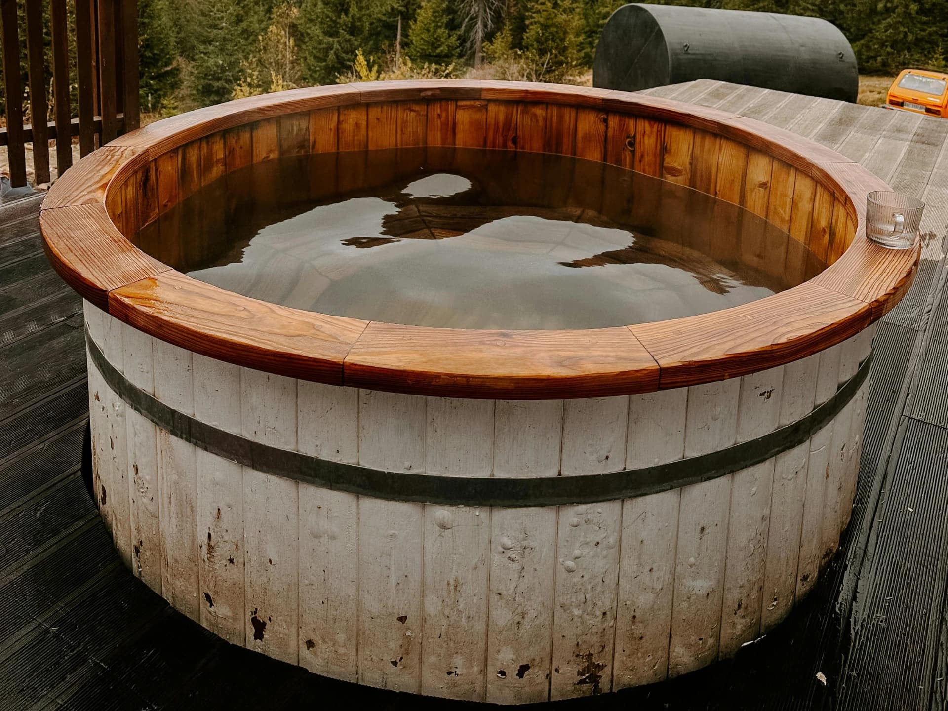 Professional hot tub removal technicians dismantling and loading spa for disposal
